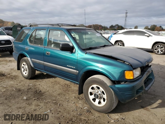 1998 Isuzu Rodeo S z VIN 4S2CK58W0W4339022, wystawiony jako Copart lot #78746864 z przebiegiem 136 138 mil mil oraz Szkoda całkowita • Salvage title. Historia ofert i sprzedaży dostępna na DreamBid. Obrazek 4.