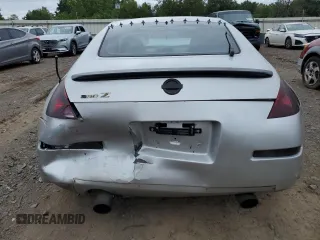2004 Nissan 350Z Touring z VIN JN1AZ34E24T060564, wystawiony jako Copart lot #69689414 z przebiegiem Nie podano mil oraz Nie do naprawy • Non repairable. Historia ofert i sprzedaży dostępna na DreamBid. Obrazek 6.