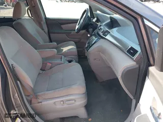 2016 Honda Odyssey SE with VIN 5FNRL5H3XGB043251, listed as a IAAI auction lot 42050805 with 156,537 mi miles. Bid and sale history available at carsss.com. Image 5.