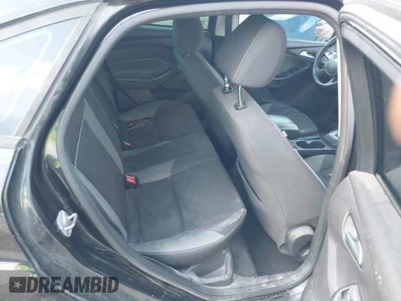 2014 Ford Focus SE with VIN 1FADP3F21EL157488, listed as a IAAI auction lot 42120325 with 198,658 mi miles and . Bid and sale history available at DreamBid. Image 8.