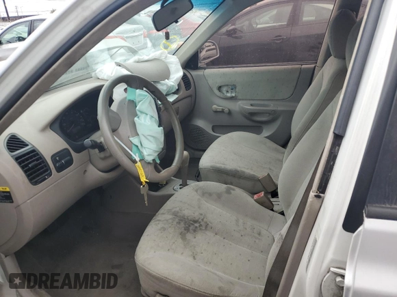 2004 Hyundai Accent GL with VIN KMHCG45C74U550647, listed as a Copart auction lot 74526474 with 115,838 mi miles and Salvage Title. Bid and sale history available at carsss.com. Image 7.