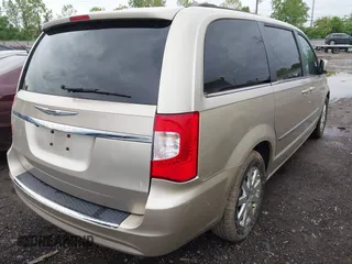 2013 Chrysler Town & Country Touring with VIN 2C4RC1BG3DR778321, listed as a IAAI auction lot 42192636 with 120,064 mi miles and . Bid and sale history available at DreamBid. Image 4.