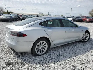 2016 Tesla Model S 90D with VIN 5YJSA1E25GF142104, listed as a Copart auction lot 50874815 with 84,917 mi miles and Salvage Title. Bid and sale history available at DreamBid. Image 3.