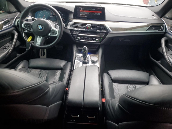 2019 BMW 5 Series M550i xDrive with VIN WBAJB9C59KB287501, listed as a Copart auction lot 59732425 with 74,345 mi miles and Salvage title. Bid and sale history available at DreamBid. Image 8.