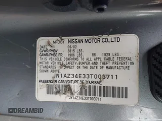 2003 Nissan 350Z Touring z VIN JN1AZ34E33T003711, wystawiony jako IAAI lot #41351191 z przebiegiem 167 503 mil mil oraz . Historia ofert i sprzedaży dostępna na DreamBid. Obrazek 9.