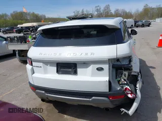 2015 Land Rover Range Rover Evoque Prestige z VIN SALVV2BG4FH076675, wystawiony jako IAAI lot #42138353 z przebiegiem 99 751 mil mil oraz . Historia ofert i sprzedaży dostępna na DreamBid. Obrazek 16.