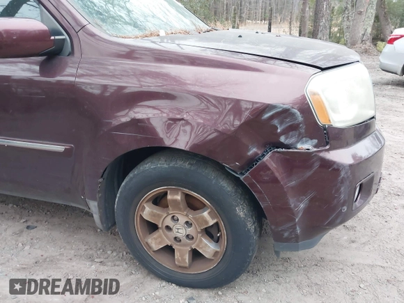 2010 Honda Pilot Touring with VIN 5FNYF4H9XAB040715, listed as a IAAI auction lot 41807334 with 262,786 mi miles and . Bid and sale history available at carsss.com. Image 19.