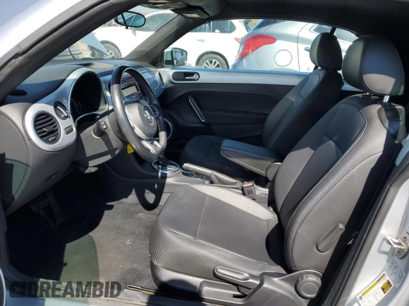 2015 Volkswagen Beetle 1.8T with VIN 3VW517AT8FM810709, listed as a Copart auction lot 48065314 with 61,924 mi miles and Salvage title. Bid and sale history available at DreamBid. Image 7.