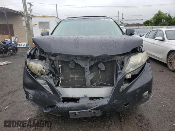 2011 Lexus RX 350 with VIN JTJBK1BA8B2015106, listed as a Copart auction lot 61424825 with 317,073 mi miles and Clean title. Bid and sale history available at DreamBid. Image 5.