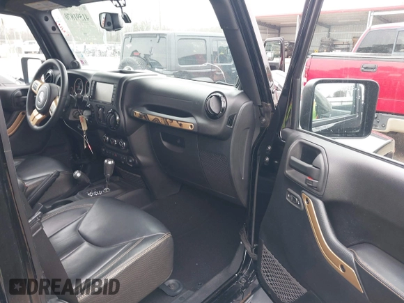 2014 Jeep Wrangler Unlimited Sahara with VIN 1C4HJWEG1EL202974, listed as a IAAI auction lot 41591870 with 17,174 mi miles. Bid and sale history available at carsss.com. Image 5.