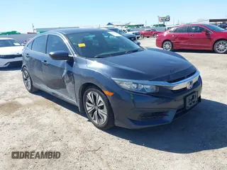 2017 Honda Civic LX z VIN 19XFC2F57HE067214, wystawiony jako IAAI lot #41781544 z przebiegiem 123 371 mil mil oraz . Historia ofert i sprzedaży dostępna na DreamBid. Obrazek 1.