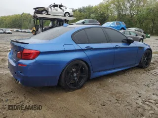 2013 BMW M5 z VIN WBSFV9C58DC772945, wystawiony jako Copart lot #55759565 z przebiegiem 78 125 mil mil oraz Tytuł czysty. Historia ofert i sprzedaży dostępna na DreamBid. Obrazek 3.