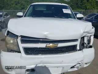 2007 Chevrolet Tahoe LT with VIN 1GNFC13J97R314853, listed as a IAAI auction lot 42684980 with 312,399 mi miles and . Bid and sale history available at DreamBid. Image 10.