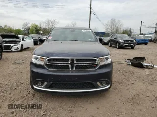 2018 Dodge Durango SXT z VIN 1C4RDJAG4JC101328, wystawiony jako Copart lot #53872975 z przebiegiem Nie podano mil oraz Szkoda całkowita • Salvage title. Historia ofert i sprzedaży dostępna na DreamBid. Obrazek 5.