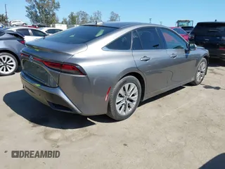2021 Toyota Mirai XLE with VIN JTDAAAAAXMA002000, listed as a IAAI auction lot 42207752 with 33,017 mi miles and . Bid and sale history available at DreamBid. Image 4.