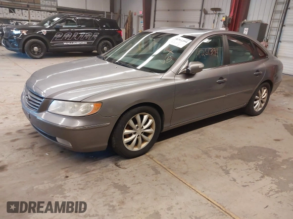 2007 Hyundai Azera SE with VIN KMHFC46F07A243229, listed as a IAAI auction lot 41261394 with 249,523 mi miles and . Bid and sale history available at DreamBid. Image 2.