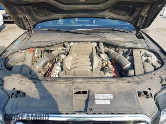 2011 Audi A8 with VIN WAUAVAFD6BN023937, listed as a IAAI auction lot 41288464 with 158,127 mi miles and . Bid and sale history available at DreamBid. Image 10.