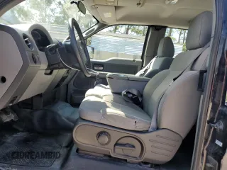 2007 Ford F-150 STX with VIN 1FTRX12W07FB12170, listed as a Copart auction lot 50452015 with 169,814 mi miles and Salvage title. Bid and sale history available at DreamBid. Image 7.
