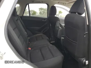 2016 Mazda CX-5 Touring with VIN JM3KE2CY5G0838663, listed as a Copart auction lot 47658065 with 51,470 mi miles and Salvage Title. Bid and sale history available at carsss.com. Image 11.
