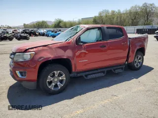 2015 Chevrolet Colorado 2WD Z71 with VIN 1GCGSCE30F1133521, listed as a Copart auction lot 62020495 with 131,268 mi miles and Salvage title. Bid and sale history available at DreamBid. Image 1.