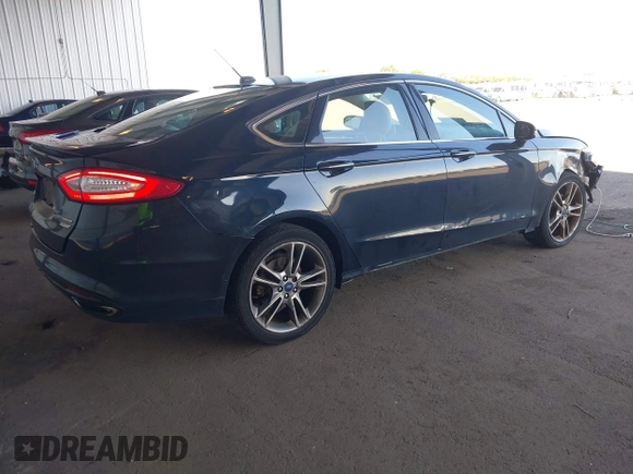 2014 Ford Fusion Titanium with VIN 3FA6P0K97ER328482, listed as a IAAI auction lot 40252350 with 137,128 mi miles. Bid and sale history available at carsss.com. Image 4.