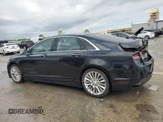 2013 Lincoln MKZ z VIN 3LN6L2G99DR826820, wystawiony jako Copart lot #57530205 z przebiegiem 161 494 mil mil oraz Czysty tytuł • Clean title. Historia ofert i sprzedaży dostępna na DreamBid. Obrazek 2.