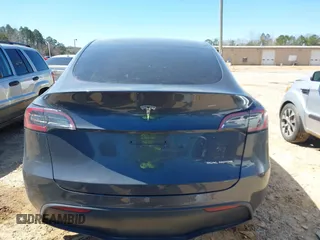 2022 Tesla Model Y Long Range with VIN 7SAYGDEE0NF387512, listed as a IAAI auction lot 41850901 with Not Provided miles and . Bid and sale history available at carsss.com. Image 16.
