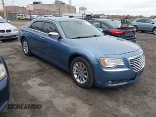 2011 Chrysler 300 with VIN 2C3CA6CT5BH575023, listed as a IAAI auction lot 42090856 with 200,309 mi miles. Bid and sale history available at carsss.com. Image 1.