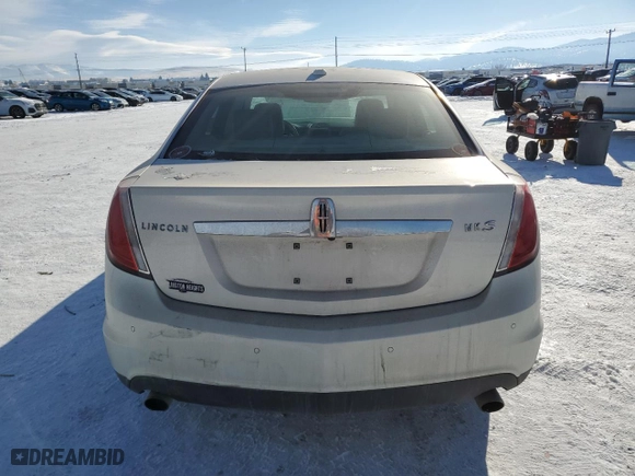2012 Lincoln MKS with VIN 1LNHL9DR1CG801907, listed as a Copart auction lot 89003845 with 140,961 mi miles and Salvage Title. Bid and sale history available at carsss.com. Image 6.