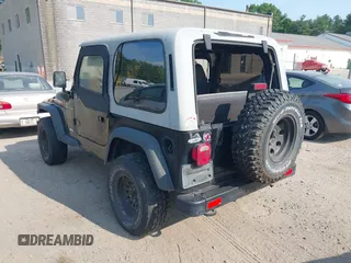 2000 Jeep Wrangler SE with VIN 1J4FA29P6YP791344, listed as a IAAI auction lot 42427688 with 184,549 mi miles and . Bid and sale history available at DreamBid. Image 3.