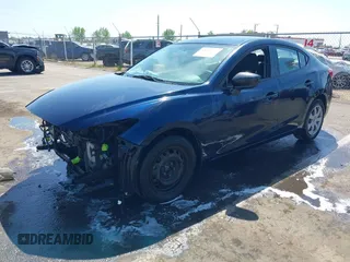 2014 Mazda 3 i SV with VIN JM1BM1T74E1117576, listed as a IAAI auction lot 42062701 with 107,528 mi miles and . Bid and sale history available at DreamBid. Image 2.