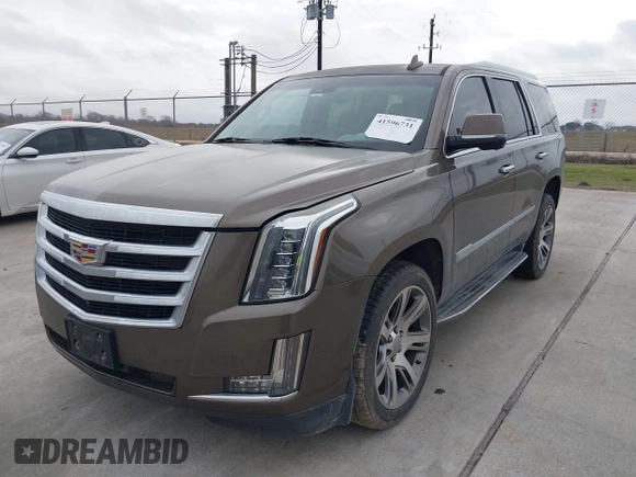 2015 Cadillac Escalade Luxury z VIN 1GYS3MKJ9FR725818, wystawiony jako IAAI lot #41596731 z przebiegiem 224 246 mil mil oraz . Historia ofert i sprzedaży dostępna na DreamBid. Obrazek 6.