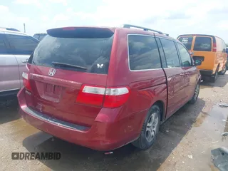 2006 Honda Odyssey EX-L with VIN 5FNRL38606B426919, listed as a IAAI auction lot 42077458 with 125,161 mi miles and . Bid and sale history available at carsss.com. Image 4.
