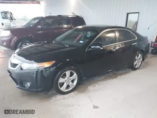 2009 Acura TSX with VIN JH4CU26629C004182, listed as a IAAI auction lot 42086811 with 206,526 mi miles. Bid and sale history available at carsss.com. Image 2.