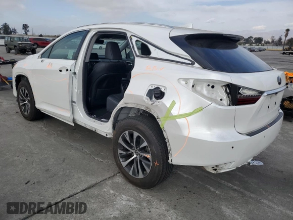 2020 Lexus RX with VIN 2T2AZMAA9LC160005, listed as a Copart auction lot 86916644 with 63,699 mi miles and Salvage Title. Bid and sale history available at carsss.com. Image 2.