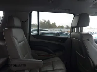 2016 Chevrolet Suburban LTZ with VIN 1GNSCJKC2GR111370, listed as a IAAI auction lot 40742857 with 199,753 mi miles and . Bid and sale history available at DreamBid. Image 8.