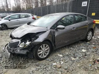 2014 Kia Forte EX with VIN KNAFX4A87E5199900, listed as a Copart auction lot 50090555 with 110,919 mi miles and Salvage Title. Bid and sale history available at carsss.com. Image 1.