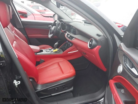 2021 Alfa Romeo Stelvio Ti with VIN ZASPAKBN9M7D09213, listed as a IAAI auction lot 41812289 with 38,410 mi miles. Bid and sale history available at carsss.com. Image 5.