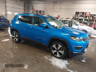 2020 Jeep Compass Latitude with VIN 3C4NJDBBXLT104849, listed as a IAAI auction lot 41606035 with 116,706 mi miles. Bid and sale history available at carsss.com. Image 1.