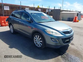 2010 Mazda CX-9 Grand Touring z VIN JM3TB3MA1A0221059, wystawiony jako IAAI lot #39278976 z przebiegiem 171 878 mil mil oraz . Historia ofert i sprzedaży dostępna na DreamBid. Obrazek 1.