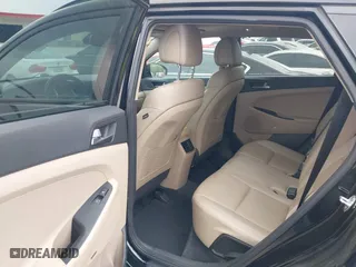2017 Hyundai Tucson Value with VIN KM8J33A26HU362363, listed as a IAAI auction lot 41940376 with 127,986 mi miles. Bid and sale history available at carsss.com. Image 8.