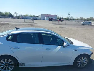 2016 Kia Optima EX with VIN 5XXGU4L35GG098080, listed as a IAAI auction lot 41994612 with 86,646 mi miles and . Bid and sale history available at carsss.com. Image 13.