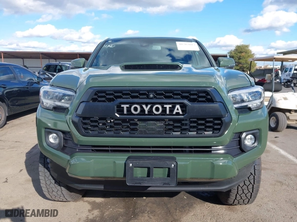2021 Toyota Tacoma 4WD SR with VIN 3TMCZ5AN4MM401998, listed as a IAAI auction lot 41712813 with 91,371 mi miles. Bid and sale history available at carsss.com. Image 13.