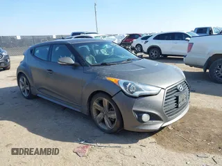 2014 Hyundai Veloster Turbo with VIN KMHTC6AE6EU204850, listed as a IAAI auction lot 41574655 with 127,836 mi miles and . Bid and sale history available at DreamBid. Image 1.