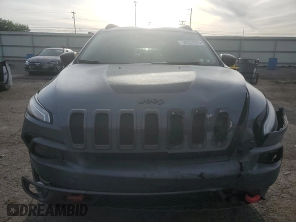 2014 Jeep Cherokee Trailhawk with VIN 1C4PJMBS3EW308706, listed as a Copart auction lot 58307975 with 90,530 mi miles and Salvage title. Bid and sale history available at DreamBid. Image 5.