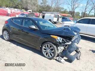 2013 Hyundai Veloster w/Gray Int with VIN KMHTC6AD9DU137473, listed as a IAAI auction lot 41846203 with 67,781 mi miles. Bid and sale history available at carsss.com. Image 1.