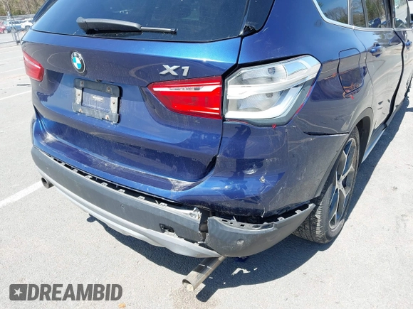 2017 BMW X1 xDrive28i with VIN WBXHT3C39H5F71525, listed as a IAAI auction lot 42050272 with 118,875 mi miles. Bid and sale history available at carsss.com. Image 6.