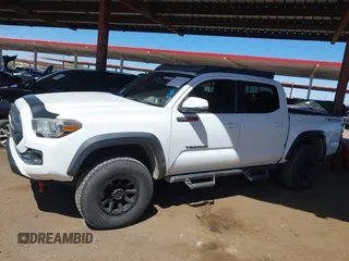 2016 Toyota Tacoma SR with VIN 5TFCZ5ANXGX028464, listed as a IAAI auction lot 41834385 with 124,407 mi miles and . Bid and sale history available at DreamBid. Image 13.
