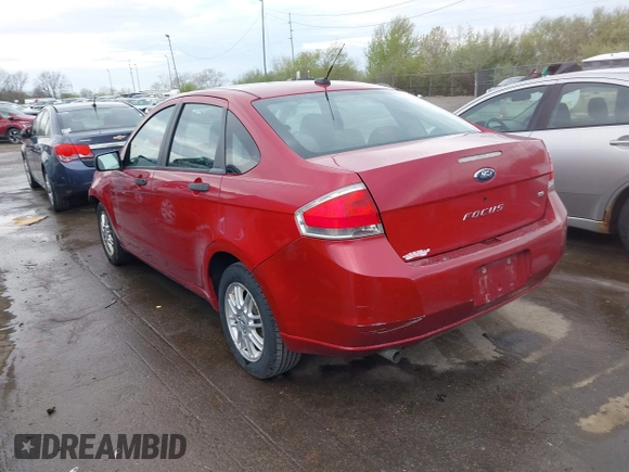 2009 Ford Focus SE with VIN 1FAHP35N09W136732, listed as a IAAI auction lot 42061783 with 143,993 mi miles. Bid and sale history available at carsss.com. Image 3.