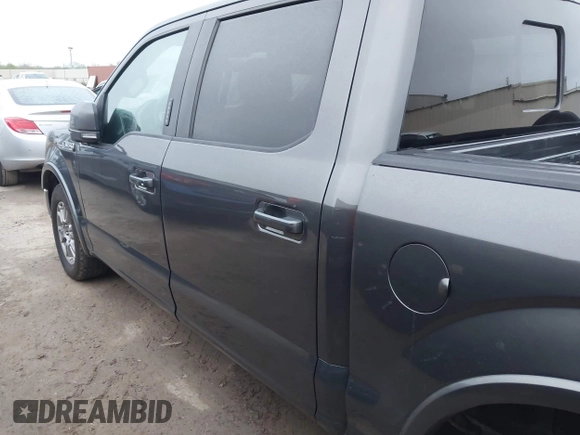 2020 Ford F-150 XL with VIN 1FTEW1C5XLFA97159, listed as a IAAI auction lot 41898490 with 121,674 mi miles and . Bid and sale history available at DreamBid. Image 14.